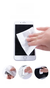 Microfiber cleaning wipes being used to remove dust from a smartphone screen and watch