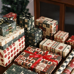 Vintage kraft Christmas wrapping paper set with reindeer and tree patterns for gifts