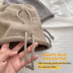 Women's warm knitted slouchy beanie with adjustable drawstring for winter styling