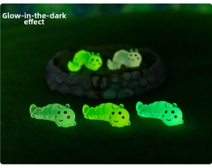 Luminous resin caterpillars glowing green in the dark for garden micro landscape decor