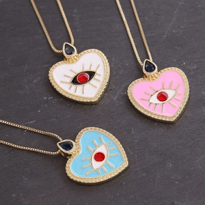 18K gold plated heart evil eye necklaces with colorful enamel and red stone details
