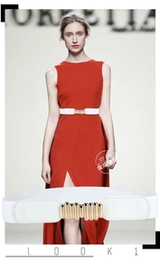 Detail of white elastic waist belt with gold cylindrical buckle on red dress