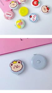 Close-up of cute cartoon bear plush mini tape measure with 1.5m dual-sided flexible ruler