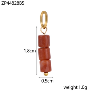 Detailed view of triple red stone beads pendant with gold loops 1.8cm 1.0g