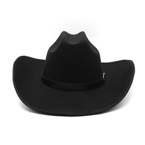 Detail of wool felt cowboy hat with leather band and silver buckle on white background