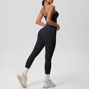 Detailed view of women's backless yoga unitard with crossover straps and push-up fit