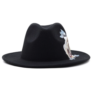 Classic black felt fedora hat with colorful floral embroidery on the flat brim for women