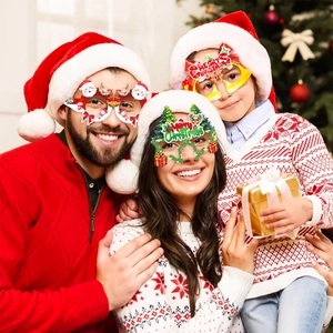 Family wearing funny Christmas party glasses featuring Santa and tree designs