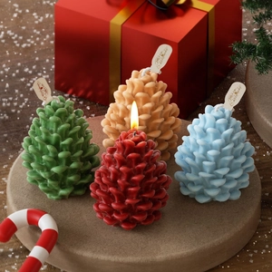 Pine cone shaped scented candle set in four colors for DIY Christmas decoration