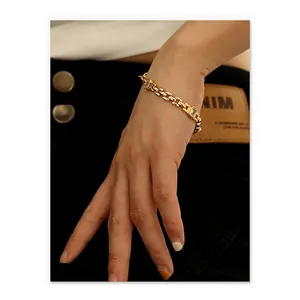 18K gold plated brass bracelet with rectangular crystals in a watch band chain style
