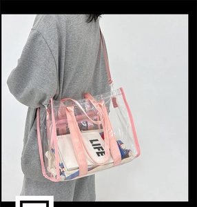 Pink trim transparent PVC crossbody bag shown on a model for size and style reference