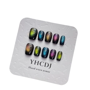 Handmade starry cat-eye press-on nails set with vibrant multi-color gradient shimmer