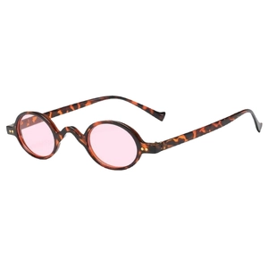Retro round tortoiseshell sunglasses with pink lenses shown from a 45-degree side angle