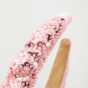 Elegant wide headband with pink handmade beads and sequins in wavy luxury design