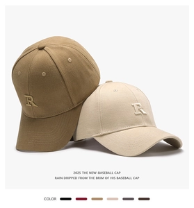 Macro shot of 3D embroidered letter R on high-density twill cotton baseball caps