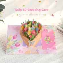 Macro view of 3D pop-up tulip flower greeting card with a mini gift card insert
