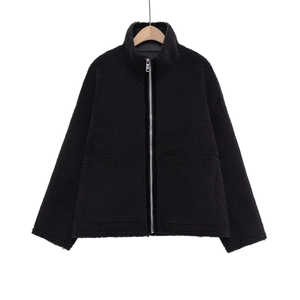 Fleece lined high-neck jacket in black with textured wool-like finish and metal zipper