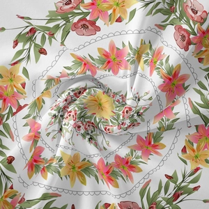 Detail of floral tapestry fabric with yellow and pink flowers and green leaves