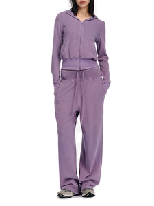 Detail of soft purple drawstring hoodie with thumbhole sleeves and matching sweatpants