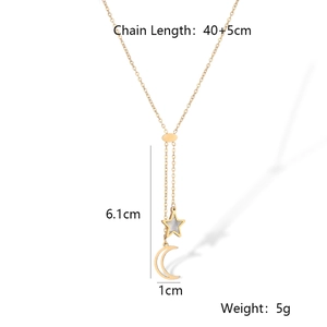 Detailed view of gold plated titanium necklace with shell star and moon charms and measurements