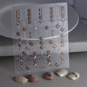 Maillard retro brown embossed nail stickers with gold diamond patterns and geometric motifs