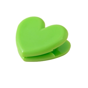 Minimalist green heart-shaped plastic clip for organizing papers and decorative use