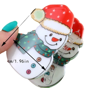 Set of snowman hair clips with red hats and green scarves shown at 1.96 inches size