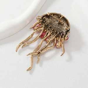 Creative crystal jellyfish brooch with tassel fringe shown from the back perspective