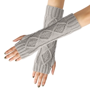 Detail of grey diamond-pattern knit arm warmers with ribbed edges and thick texture