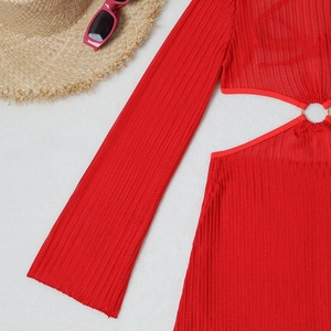 Detail of red hollow-out mesh swimsuit with knit texture and metal ring connection
