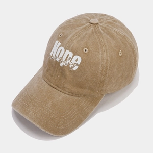 Detailed macro view of khaki washed twill fabric and Nope not today print on baseball cap