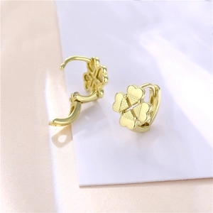 Golden clover hoop earrings with four heart petals and textured metallic finish