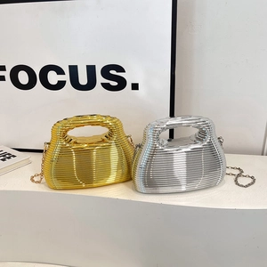 Metallic striped hard shell evening bags in gold and silver with elegant chain straps