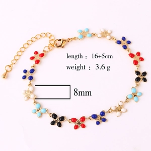 Detail view of colorful enamel butterfly bracelet with length and weight specifications