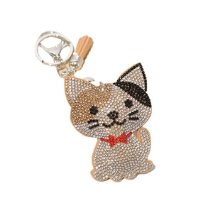 Classic cartoon cat keychain with sparkling rhinestones and a brown tassel charm