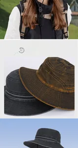Détail d'un chapeau de soleil vintage à large bord avec œillets et boucle en cuivre