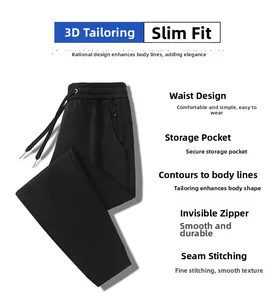 Macro view of men's black sports pants with 3D tailoring, zip pockets, and elastic waist