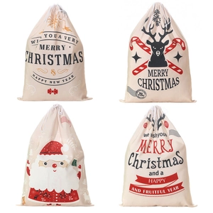 Set of four canvas Christmas gift bags with Santa and reindeer prints and white drawstrings