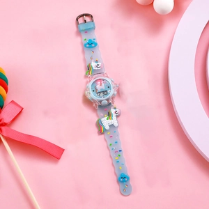 Kids digital watch with 3D cartoon unicorn and rainbow design on light blue silicone strap