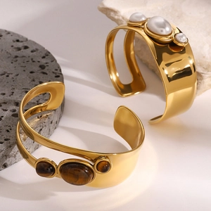 Gold hollow stainless steel open cuff bracelet with natural pearls and tiger eye stones