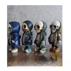 Side view of trendy skeleton figurines in hoodies and sneakers for Halloween decor