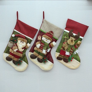 Three 3D Christmas stockings featuring Santa, Snowman, and Reindeer on a white background