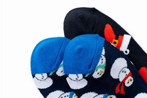 Close-up of premium knit fabric and reinforced toe stitching on Christmas socks
