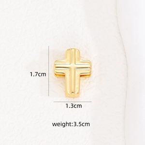 Detailed view of a golden cross charm for mesh bracelets with 1.7cm height measurements