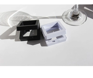 Black and white floating film display boxes for jewelry with elegant sun shadows