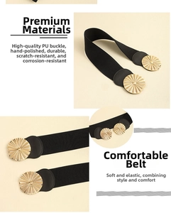 Detail of elastic waist belt with a golden sunburst metal buckle on black fabric