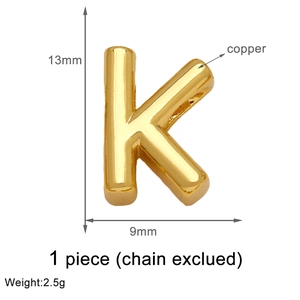 Detailed view of gold plated copper letter K pendant with dimensions and weight specs