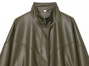 Macro detail of dark olive green faux leather jacket with stand collar and zipper