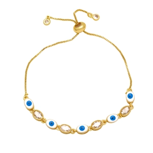 Detail of evil eye bracelet with blue enamel, clear zircons and adjustable slider clasp