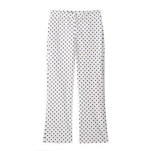 Sommerliche weiße High-Waist-Hose mit schwarzem Punktemuster für Damen im Trend
